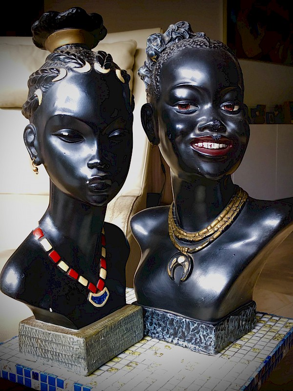 Pair of African female busts