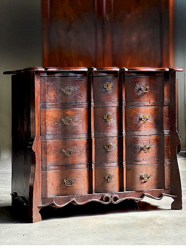 baroque style serpentine chest of drawers