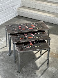 A trio of 70s ceramic tiles nesting tables