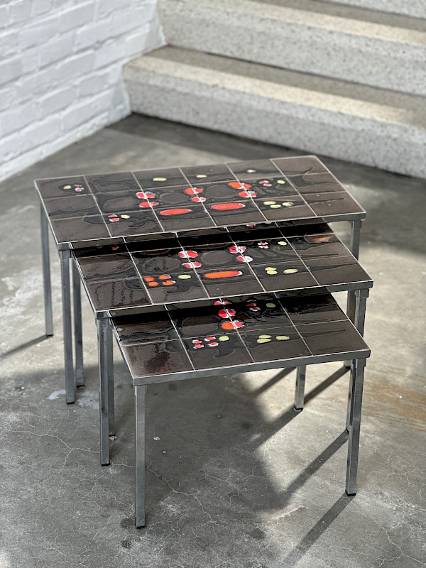 A trio of 70s ceramic tiles nesting tables