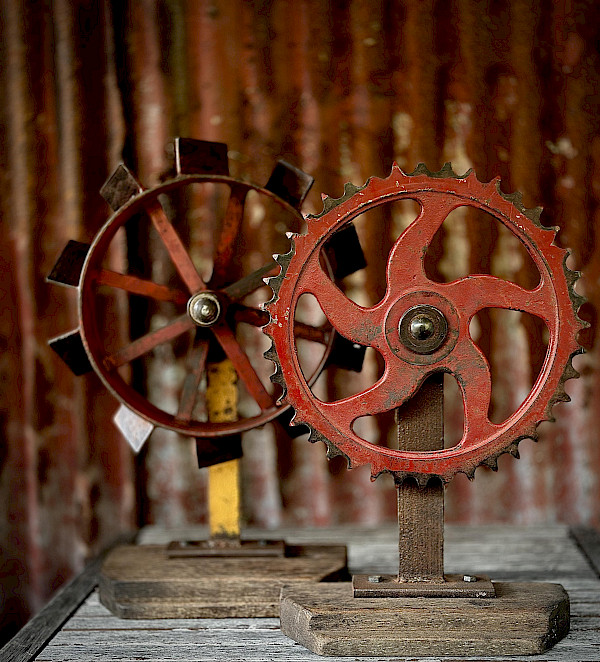 Antique industrial cast-iron gear sculptures
