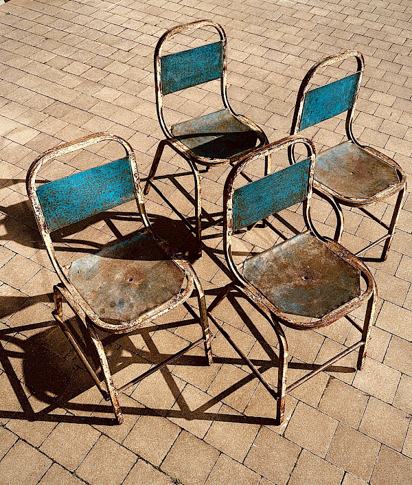 4 Industrial stackable chairs