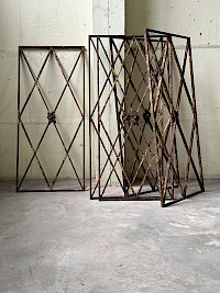 Collection of five antique iron security grates